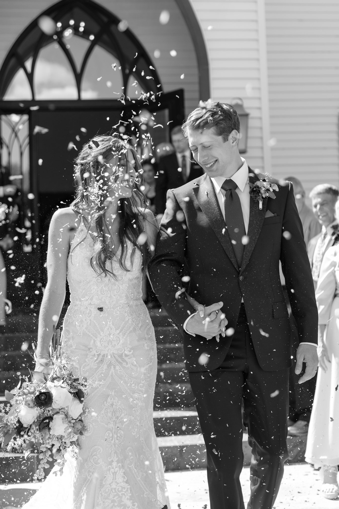 DFW wedding photographer captures picture of bride and groom leaving wedding ceremony