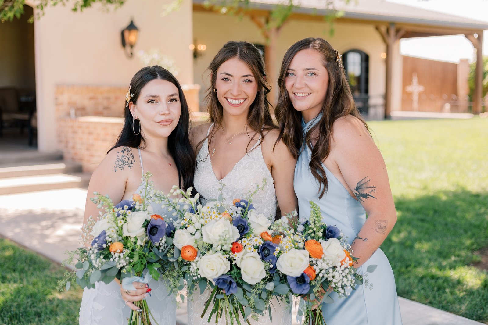 Bridal Party holding bouquets at The Ashton Depot Fort Worth